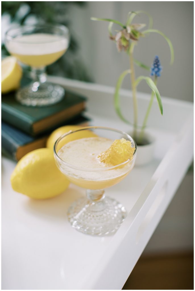 refreshing bee's knees cocktail in a chilled coupe